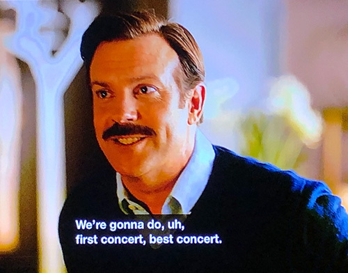 Ted Lasso says, "We're gonna do, uh, first concert, best concert."