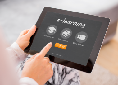 educator visiting elearning website via tablet