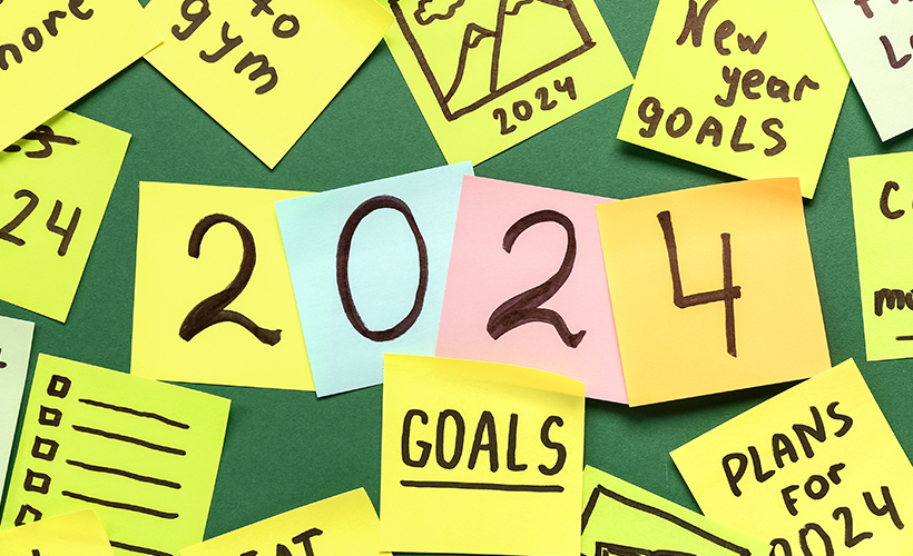 2024 goals on sticky notes, representing New Year's resolutions