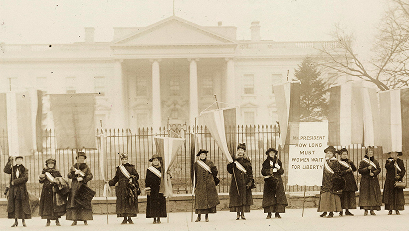Women protesting for the right to vote outside of the White House