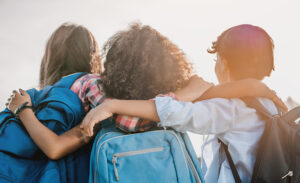 Students in a group hug