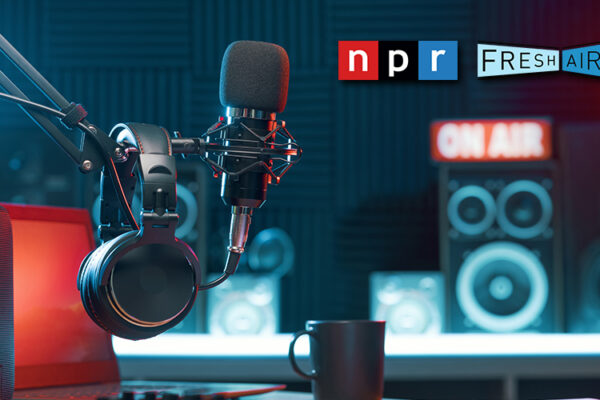 Microphone and headphones used in a podcast with "NPR Fresh Air" logo