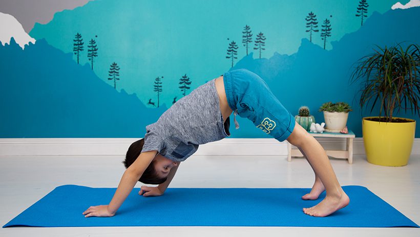 Boy in yoga position