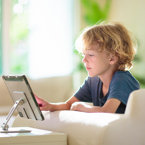 Child working in tablet