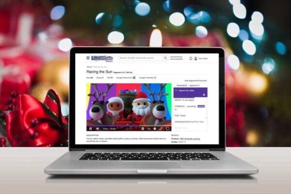 Learn360 on a laptop with a festive holiday background