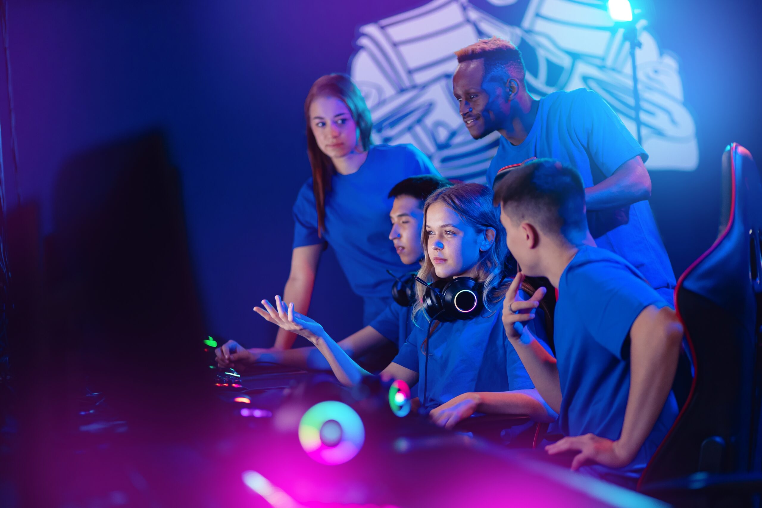 Teens playing video games