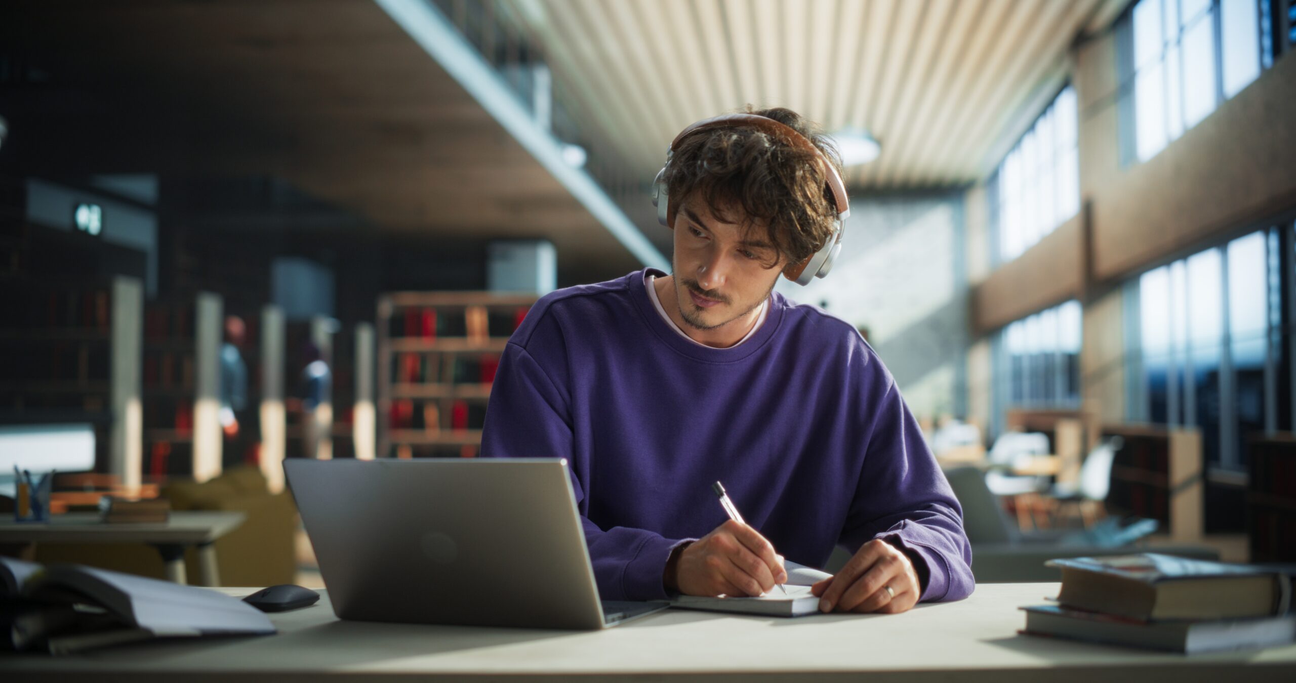 College student sitting at a computer