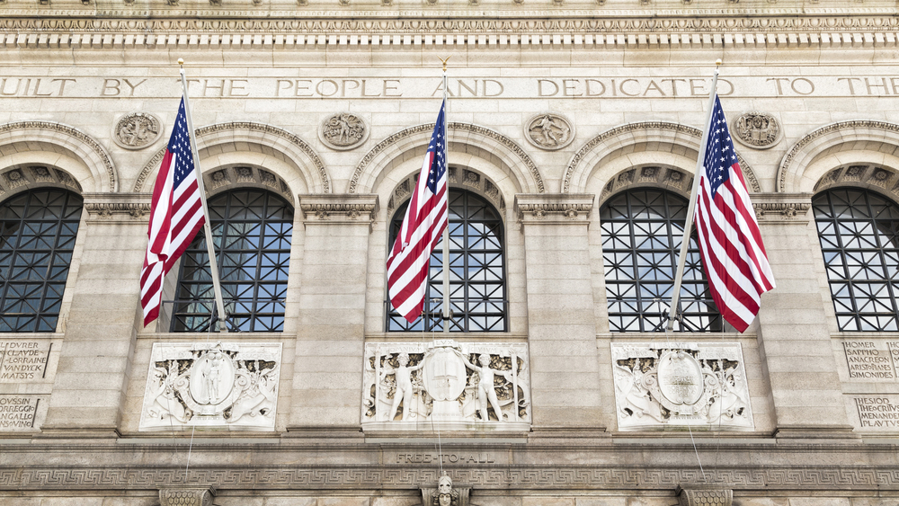 US flags on Boston Public Library